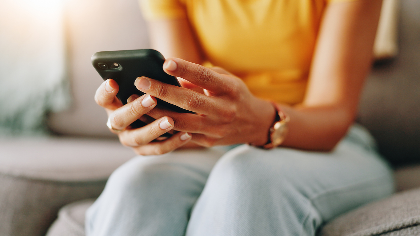 A parent making a call at home